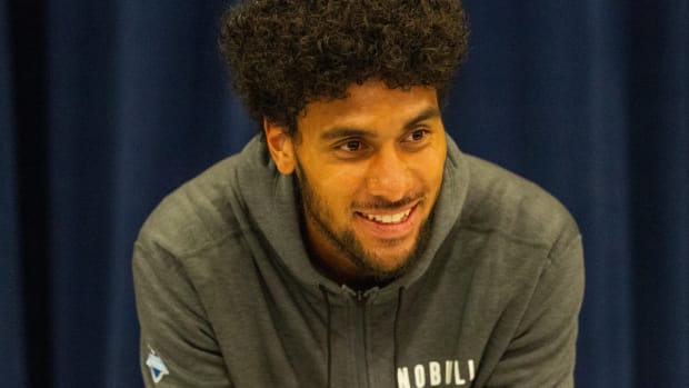 Mar 1, 2024; Indianapolis, IN, USA; Utah wide receiver Devaughn Vele (WO31) talks to the media during the 2024 NFL Combine at Lucas Oil Stadium. Mandatory Credit: Trevor Ruszkowski-USA TODAY Sports